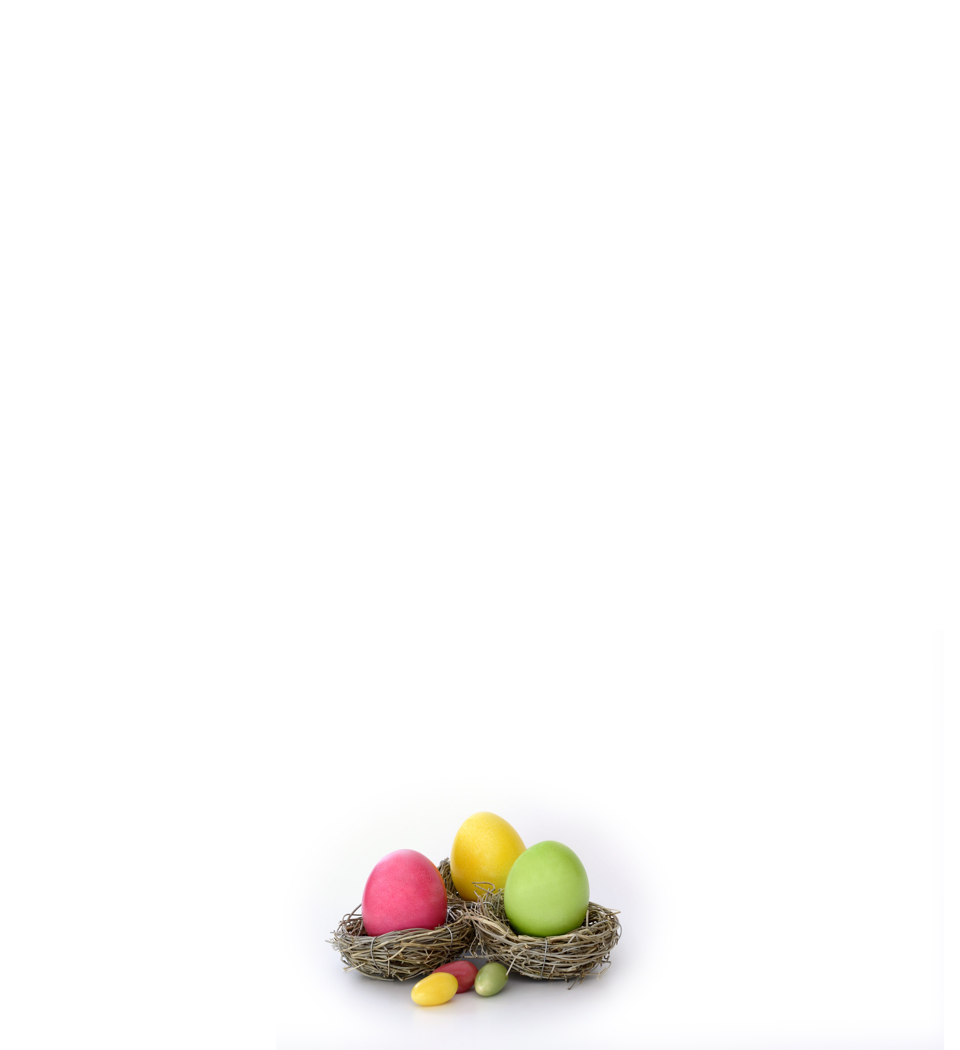 Place card with pink, yellow and green Easter eggs in straw nests